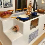 Чем отделать печь: плитка, штукатурка, кирпич, камень и металл